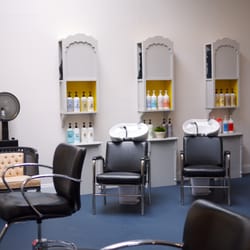Cameo Salon - Comfortable shampoo bowls and unique custom cabinets