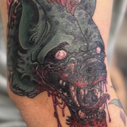 Tried and True Tattoo By Rick Medina - I wanted a hyena that looked gnarly and different. Rick obviously did not disappoint..