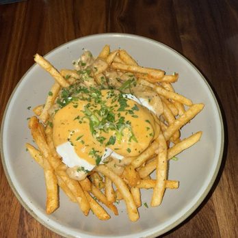 VINYL - Poached egg poutine - New American Near Me - Charlotte, North Carolina VINYL - Poached egg poutine - New American Near Me - Charlotte, North Carolina