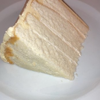 Wright’s Tavern - Wedding cake slice. - Steakhouses Near Me - Clayton, Missouri Wright’s Tavern - Wedding cake slice. - Steakhouses Near Me - Clayton, Missouri