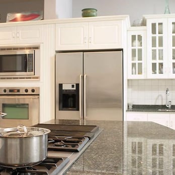 Hermann Remodeling - a modern kitchen with stainless steel appliances - General Contractors Near Me - Northbrook, Illinois Hermann Remodeling - a modern kitchen with stainless steel appliances - General Contractors Near Me - Northbrook, Illinois