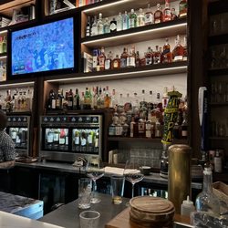 Fattoria - Grabbed a seat at the well stocked bar!