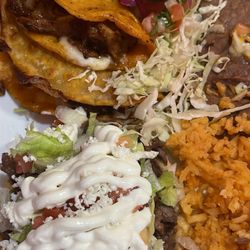Plaza Mexican American Food - My husband's plate had 2 birria tacos, sope, rice and beans. He loved it!