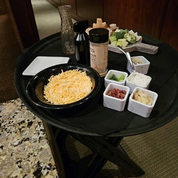 The Melting Pot - Prep to make Loaded Baked Potatoe Fondue - Fondue Near Me - Bedford, Massachusetts