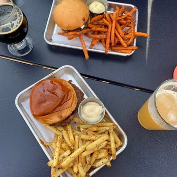 Tap Society - Fig and Goat Cheese Burgers (one with GF bun), sweet potato fries, and garlic pepper fries - Burgers Near Me - Minneapolis, Minnesota Tap Society - Fig and Goat Cheese Burgers (one with GF bun), sweet potato fries, and garlic pepper fries - Burgers Near Me - Minneapolis, Minnesota
