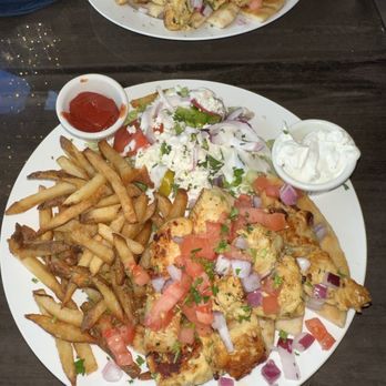 Nick's Taverna - Chicken souvlaki dinner with tzatziki sauce and fries - Mediterranean Near Me - Ashburn, Virginia Nick's Taverna - Chicken souvlaki dinner with tzatziki sauce and fries - Mediterranean Near Me - Ashburn, Virginia