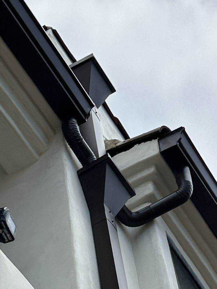 Slide of Geo' Metal And Gutters