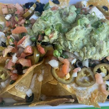 Backyard - Gilbert - Sad nachos and why was that guacamole so light in color! Worst guacamole ever! - Cocktail Bars Near Me - Gilbert, Arizona