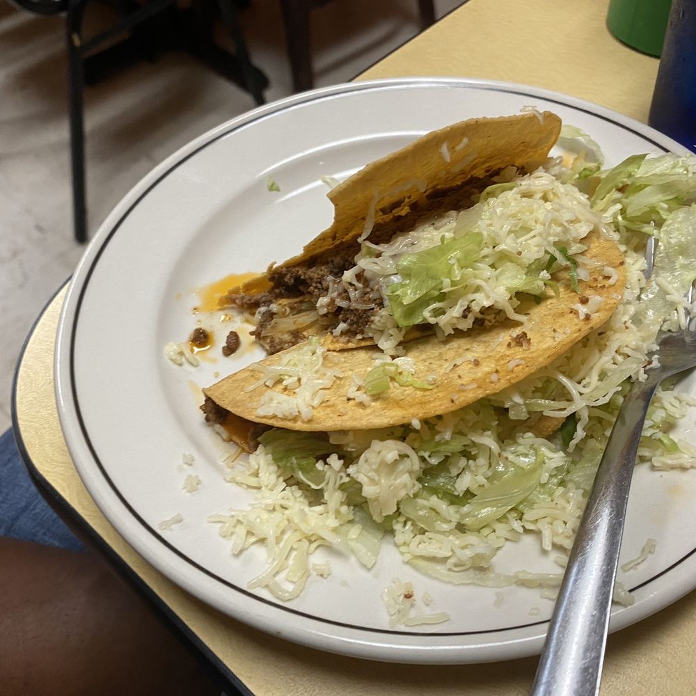 El Molcajete - a plate of food on a table - Mexican Near Me - Rock Hill, South Carolina El Molcajete - a plate of food on a table - Mexican Near Me - Rock Hill, South Carolina
