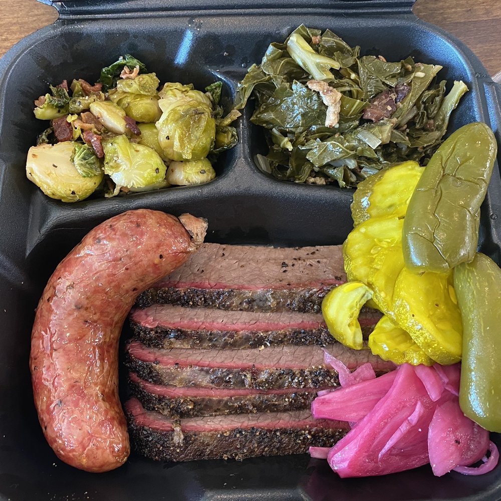 Killen's Barbecue - Two Meat Plate with lean brisket, sausage, collard greens, and Brussels sprouts. - Barbeque Near Me - Shenandoah, Texas Killen's Barbecue - Two Meat Plate with lean brisket, sausage, collard greens, and Brussels sprouts. - Barbeque Near Me - Shenandoah, Texas