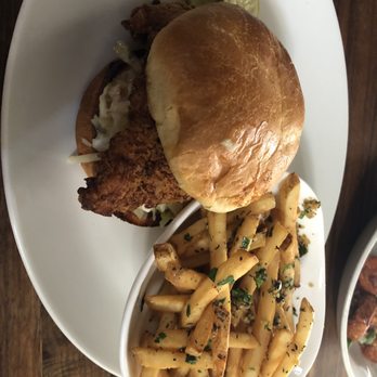 Yard House - Nashville Hot Chicken Sandwich with garlic fries - New American Near Me - Sacramento, California Yard House - Nashville Hot Chicken Sandwich with garlic fries - New American Near Me - Sacramento, California