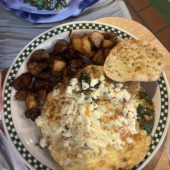 West Side Market Cafe - Open Face Greek Omelet - Breakfast & Brunch Near Me - Cleveland, Ohio West Side Market Cafe - Open Face Greek Omelet - Breakfast & Brunch Near Me - Cleveland, Ohio
