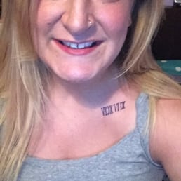 The tattoo I had done here is visible in this photo. My right collar bone. Roman numeral date in dark purple ink. The tattoo I had done here is visible in this photo. My right collar bone. Roman numeral date in dark purple ink.