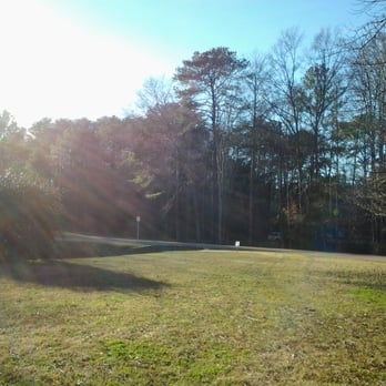 Inverness Disc Golf Course InDiGo - The open field of Hole 6 looking towards the parking lot. - Disc Golf Near Me - Birmingham, Alabama Inverness Disc Golf Course InDiGo - The open field of Hole 6 looking towards the parking lot. - Disc Golf Near Me - Birmingham, Alabama