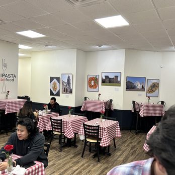 ARTIPASTA - people sitting at tables in a restaurant - Italian Near Me - Austin, Texas ARTIPASTA - people sitting at tables in a restaurant - Italian Near Me - Austin, Texas