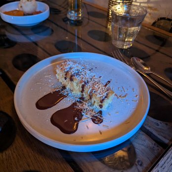 Bouche - Gateau coconut, chocolate sauce - French Near Me - San Francisco, California Bouche - Gateau coconut, chocolate sauce - French Near Me - San Francisco, California