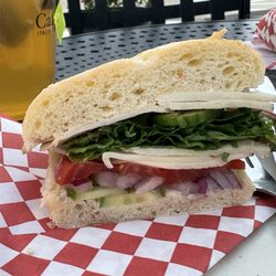Caffe Capri - Turkey sandwich on ciabatta with provolone, and cucumbers.