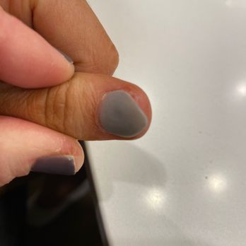 Glam Boutique Nails and Spa - Thumb nail. Off center file. Poor nail polish quality, "lumpy" nail. - Nail Salons Near Me - Springfield, Missouri Glam Boutique Nails and Spa - Thumb nail. Off center file. Poor nail polish quality, "lumpy" nail. - Nail Salons Near Me - Springfield, Missouri
