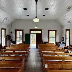 Barberville Pioneer Settlement - Pews in the church