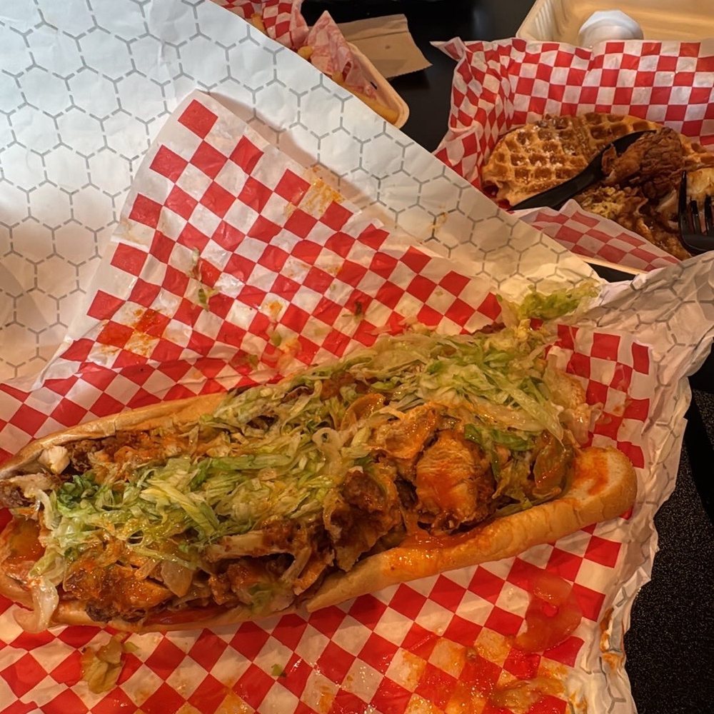 Avery’s Chicken & Waffles - Chicken sandwich tossed in buffalo with blue cheese added - Food Trucks Near Me Avery’s Chicken & Waffles - Chicken sandwich tossed in buffalo with blue cheese added - Food Trucks Near Me