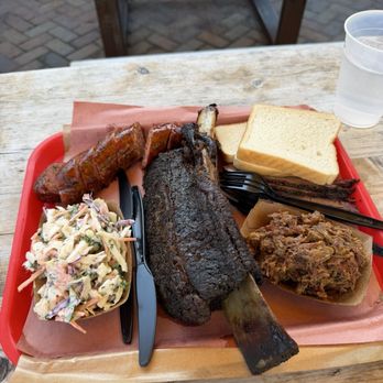 Terry Black's Barbecue - 1 beef rib 1/2 lbs smoked sausage  1/2 lbs chopped beef  1/2 lbs brisket  Small coleslaw - Barbeque Near Me - Fort Worth, Texas