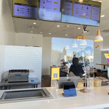 Somisomi - a restaurant counter with menus on the wall - Ice Cream & Frozen Yogurt Near Me - Irvine, California Somisomi - a restaurant counter with menus on the wall - Ice Cream & Frozen Yogurt Near Me - Irvine, California