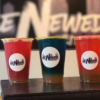 Renewed Nutrition - three cups of juice on a table - Juice Bars & Smoothies Near Me - Camden, New Jersey Renewed Nutrition - three cups of juice on a table - Juice Bars & Smoothies Near Me - Camden, New Jersey