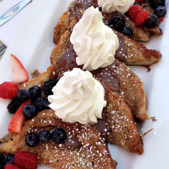 The Attic - Cinnamon French toast topped off with chantilly cream, Nutella, and seasonal fruits. - Breakfast & Brunch Near Me - Long Beach, California