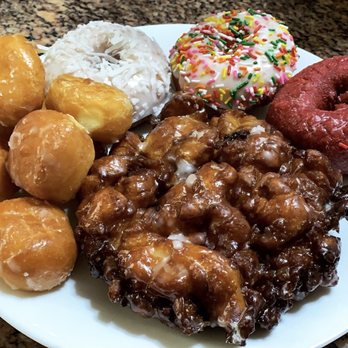 Donut Queen - Half dozen donut holes, shredded coconut, sprinkles, red velvet & apple fritter. 10/10 getting again!! - Donuts Near Me - Vacaville, California