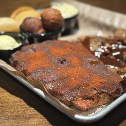 Corky's Ribs & BBQ - 1/3 Dry Rub Ribs and Beef Brisket with hush puppies and white cheddar cheese grits