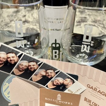 Bottleworks Hotel - Loved the Photo Booth and details throughout like wine glasses and opener in the room - Hotels Near Me - Indianapolis, Indiana