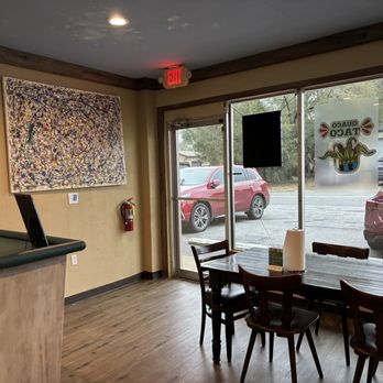 Guaco Taco - a view of a table and chairs in a restaurant - Tacos Near Me - Valparaiso, Florida