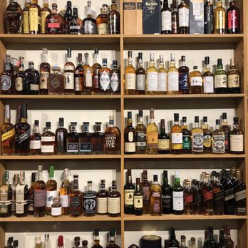 Of Grape & Grain - a shelf of liquor bottles - Beer, Wine & Spirits Near Me - Aspen, Colorado Of Grape & Grain - a shelf of liquor bottles - Beer, Wine & Spirits Near Me - Aspen, Colorado