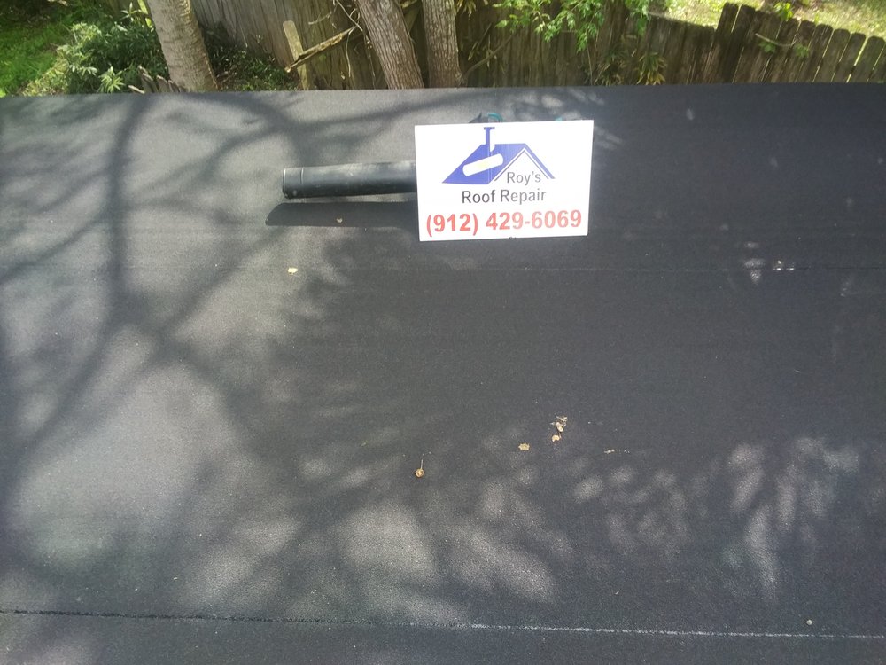 Slide of Roy's Roof Repair