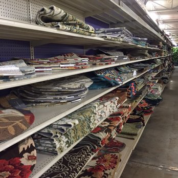 At Home - Wall of rugs - Home Decor Near Me - Jeffersontown, Kentucky