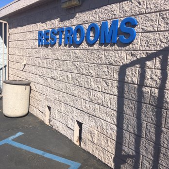Chevron - the front of a building with a sign that says restrooms - Gas Stations Near Me - Temecula, California