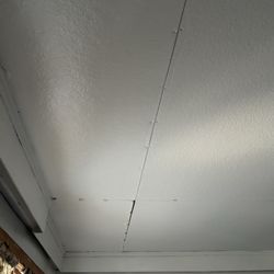 4k River Ranch RV - Ceiling paneling mismatched and pieced together.