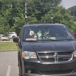 Max in the VAN waiting for me to get done shopping or in this case being robbed by their tow truck company