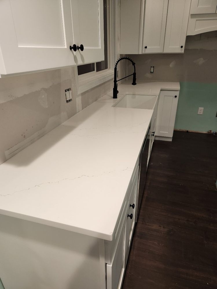 Slide of Dan's Granite and Renovations