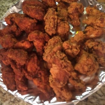 Hooters - Hot wings on the left side and mild wings on the other side - Sports Bars Near Me - Schaumburg, Illinois Hooters - Hot wings on the left side and mild wings on the other side - Sports Bars Near Me - Schaumburg, Illinois