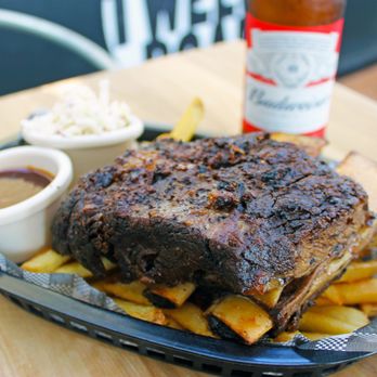 Twelve Boar - Two Beef Ribs with fries, 'slaw, BBQ Sauce & a Bud. - American Near Me - Cleveland, QLD Twelve Boar - Two Beef Ribs with fries, 'slaw, BBQ Sauce & a Bud. - American Near Me - Cleveland, QLD