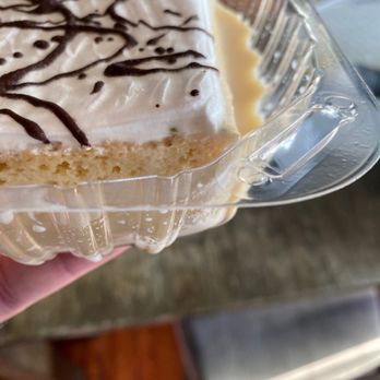 Vivian's Bakery - a hand holding a piece of cake - Bakeries Near Me - Lynwood, California Vivian's Bakery - a hand holding a piece of cake - Bakeries Near Me - Lynwood, California