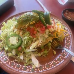 El Charro Mexican Grill - Chicken tostada that I added jalapeños to .