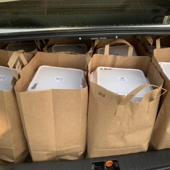 Village Deli Sub & Pub - the back of a car filled with bags of laptops - American Near Me - Augusta, Georgia Village Deli Sub & Pub - the back of a car filled with bags of laptops - American Near Me - Augusta, Georgia