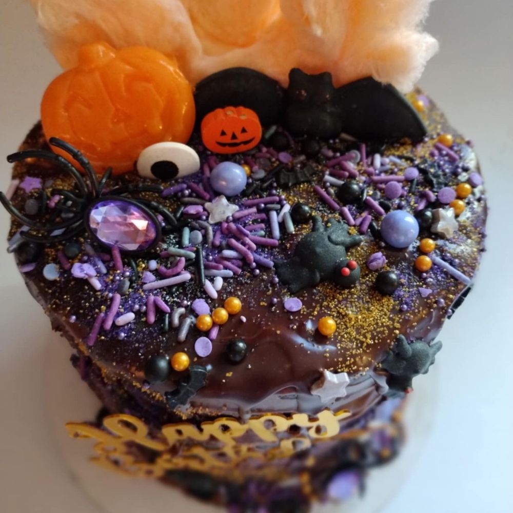 Le Petit Oiseau Bakery - Chocolate cake with peanut butter mousse, vanilla buttercream and chocolate ganache on top. With candy corn cotton candy - Bakeries Near Me - Ashfield, Massachusetts Le Petit Oiseau Bakery - Chocolate cake with peanut butter mousse, vanilla buttercream and chocolate ganache on top. With candy corn cotton candy - Bakeries Near Me - Ashfield, Massachusetts