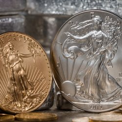 Royal Gold Group - Gold and Silver Liberty Dollar Coins.