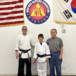 Won Moo Hapkido - Grandmaster sang Yun Lee at black belt testing.