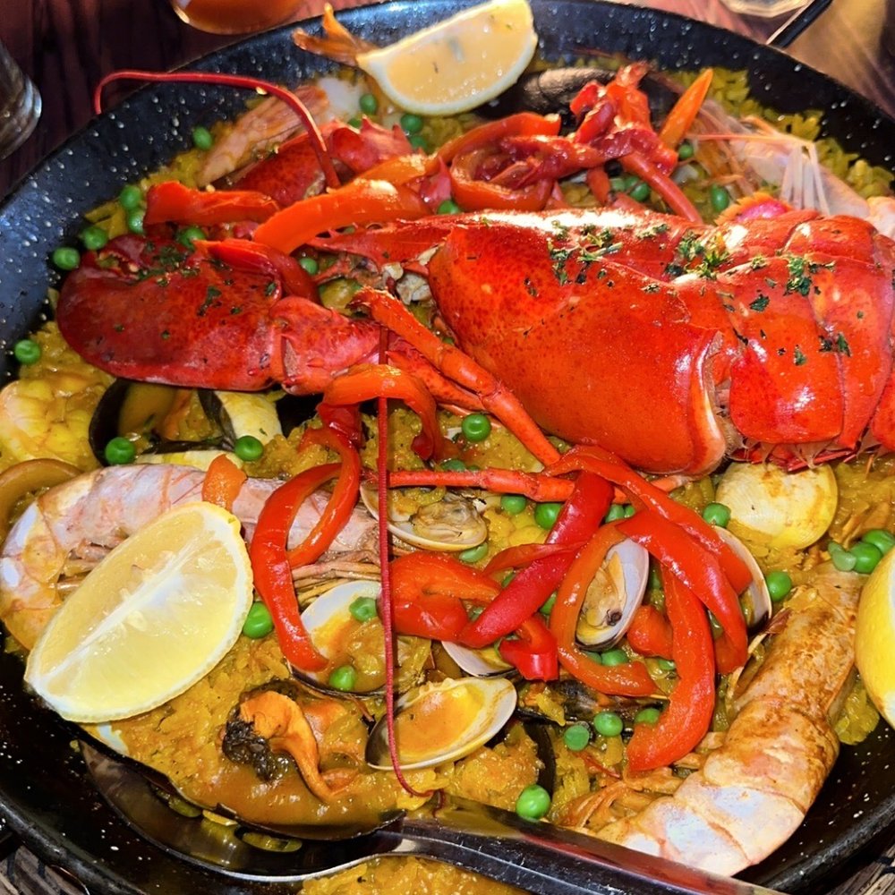 Tapelia - Seafood paella with a whole lobster - Spanish Near Me - Miami Beach, Florida Tapelia - Seafood paella with a whole lobster - Spanish Near Me - Miami Beach, Florida