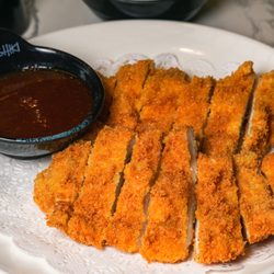 Shiki Sushi Bar & Japanese Grill - Spokane - Chicken Katsu - a favorite for all, kids included! Indulge in the crispy goodness that brings smiles with every bite.