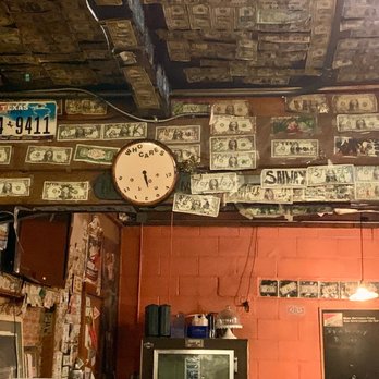Sunset Bar & Grill - a clock and money bills on the ceiling - Bars Near Me - Alcova, Wyoming Sunset Bar & Grill - a clock and money bills on the ceiling - Bars Near Me - Alcova, Wyoming